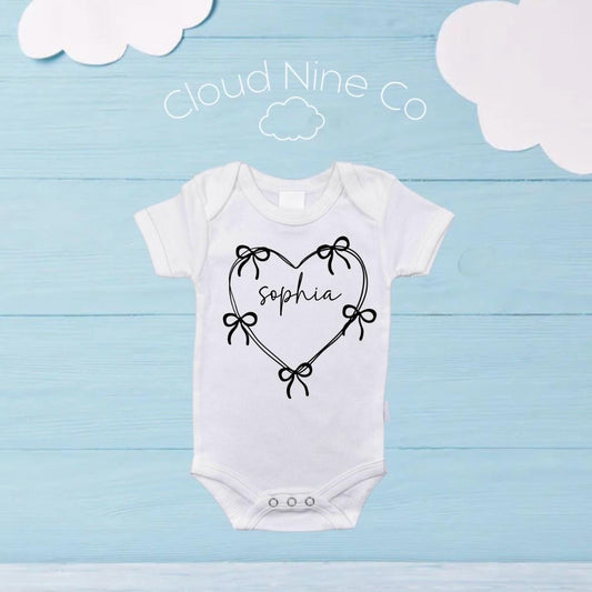 Personalised Baby Name Bodysuit – Custom Heart & Bow Design | Newborn Outfit, Name Reveal Onsie, Baby Shower Gift, Keepsake Clothing Romper